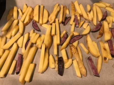potatoes on lined baking sheet