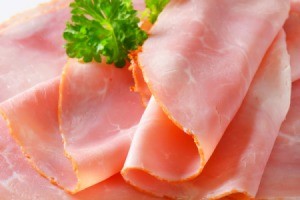 Closeup of sliced ham lunch meat.