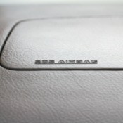 Closeup of a dashboard airbag.