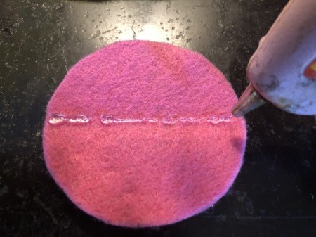 Felt Fortune Cookies - fold circle in half, use the indentation to lay down a line of hot glue