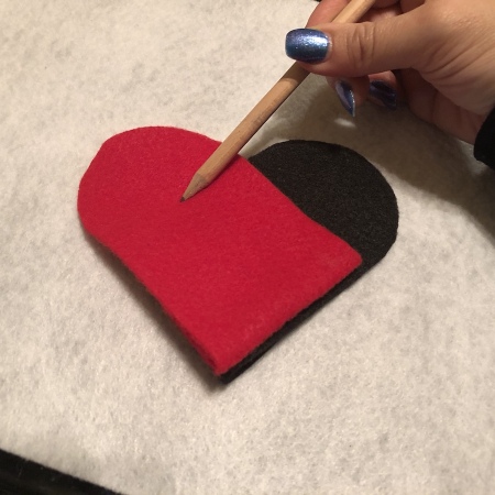 Woven Felt Heart - mark on the red felt where the black edge is underneath