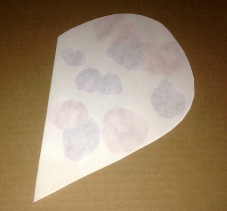 Heart Symmetry Paintings - fold the blank side down over the side with the paint and press and spread the paint