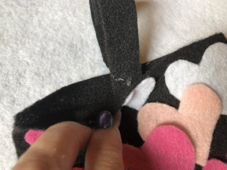 No-Sew Gradient Felt Heart Purse - dab glue on outside of the  bottom edge and press to the inside of the purse in the center
