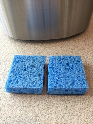 Make Your Sponge Last Twice as Long - blue sponge cut in half