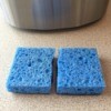 Make Your Sponge Last Twice as Long - blue sponge cut in half