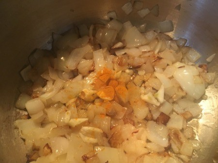 onions and tumeric added to pan