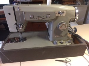 Finding User Manual for Vactric Sewing Machine - sewing machine in carrying case base