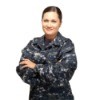 A woman in a U.S. Navy camouflage uniform.