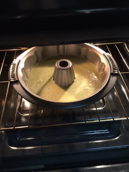 batter in bundt pan in oven