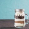 Hot chocolate mix in a jar with a handle.