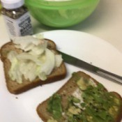 A sandwich being made with Everything but the Bagel Seasoning.