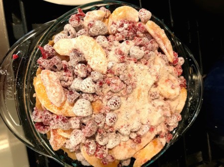 fruit added to pie pan