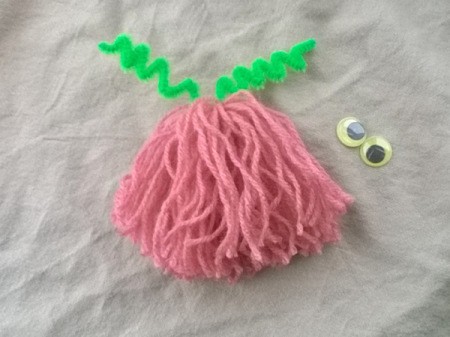 Making a Woolly Monster - bend the pipe cleaner to make antennae