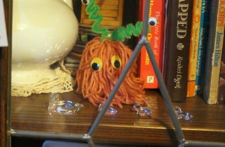 Making a Woolly Monster - finished monster inside a display cabinet