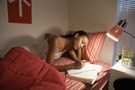 Young Woman Studying at College