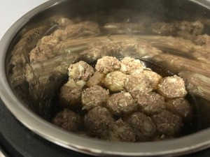 formed meatballs in pot