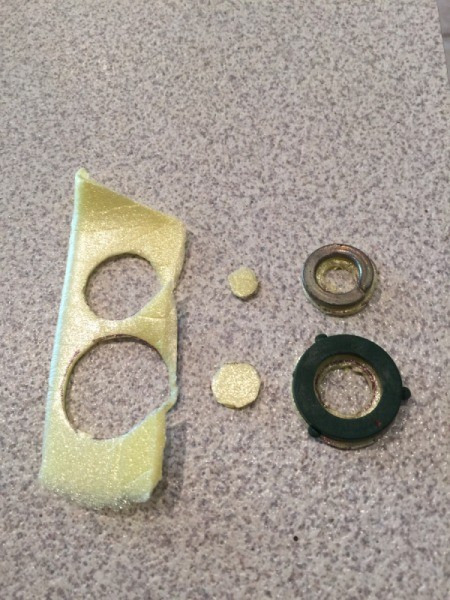 Gaskets cut from a piece of egg carton styrofoam.