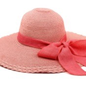 Faded red sun hat with a red bow.