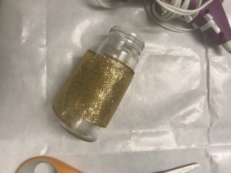 Upcycled Vase from Pepper Grinder - cut a piece of ribbon to fit around the bottle