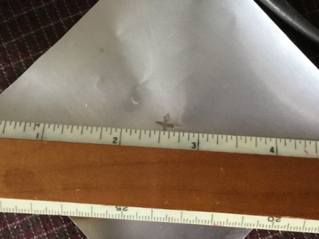 Aluminum Can Pinwheel - use a ruler to find the center of the square and mark it