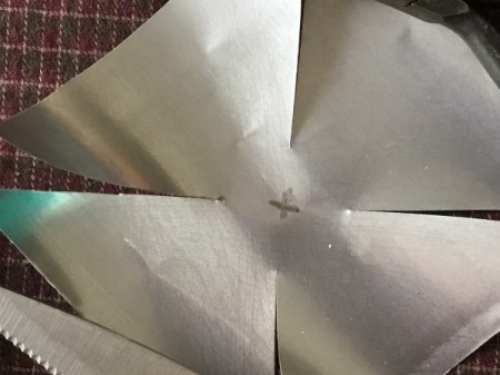 Aluminum Can Pinwheel - cut a line from each corner to within an inch of the center