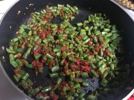 tomato paste added to pan