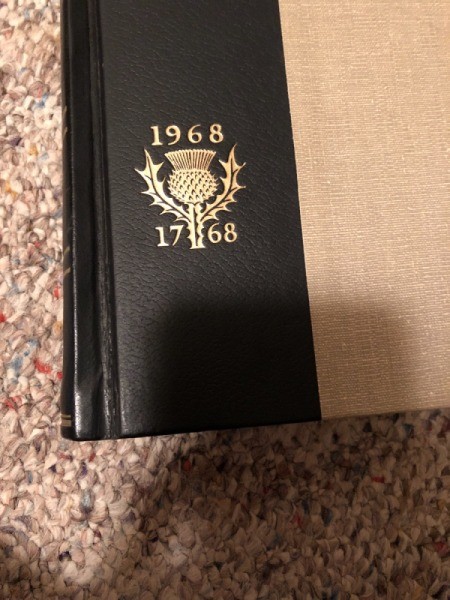 Value of Encyclopedia Britannica - photo of emblem near the lower front near spine