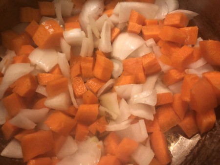 carrots and onions in the pan