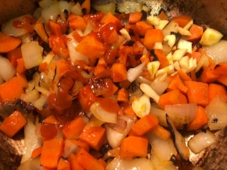 spices added to carrots and onions