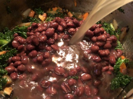 black beans and broth added to soup
