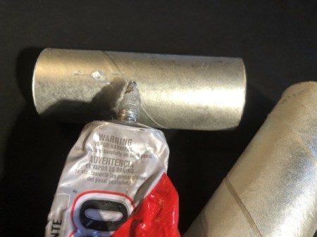 Cardboard Tube Pencil Organizer - apply a line of glue to one of the tubes