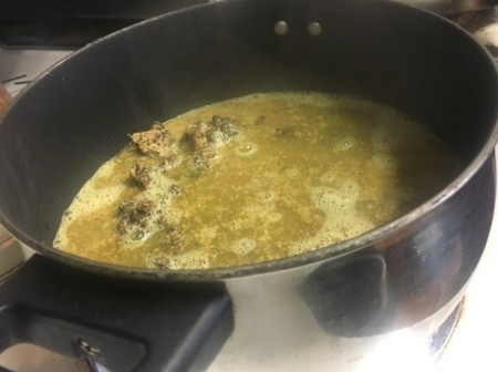 Walnut and Pomegranate Chicken Stew cooking in pan