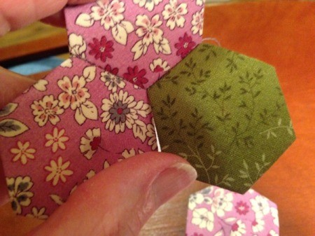 English Paper Pieced Hexagons - now stitch to the center