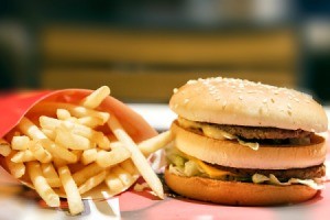 Big Mac hamburger and a side of fries.