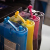 Refillable printer ink cartridges