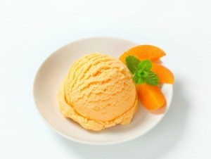 Peach Ice Cream with slices of peaces.