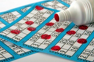 Bingo cards and a bingo dauber.