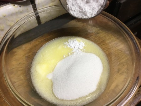 adding powdered sugar & sugar to melted butter