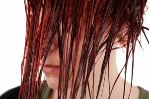 Woman with dyed wet hair