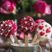 Valentines day cake pops with rose in background