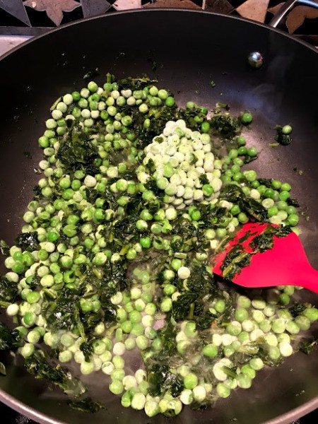 Sauteing spinach and peas