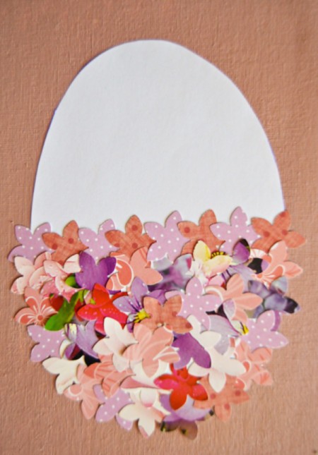 Easter Egg Collage Decoration - punch flowers from calendar page and cardstock and glue to the bottom half of the egg