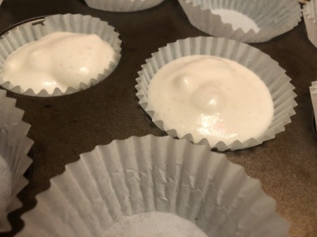 filling lined cupcake pan