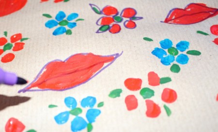 Make Your Own Wrapping Paper -  make rough outline shapes around the shapes with a marker once the paint is dry