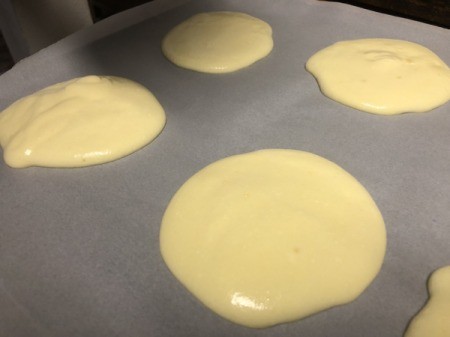 circles if batter on lined baking pan