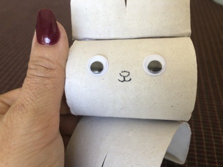 Cardboard Tube Bunnies - draw a nose and mouth in the center of the face