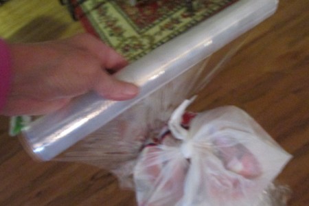 Having a Big Girls Slumber Party - plastic wrap for game