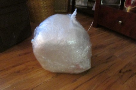 Having a Big Girls Slumber Party - ball of wrap that will eventually have goodie bags wrapped inside