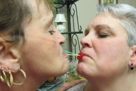 Having a Big Girls Slumber Party - transferring candy from one pick to another