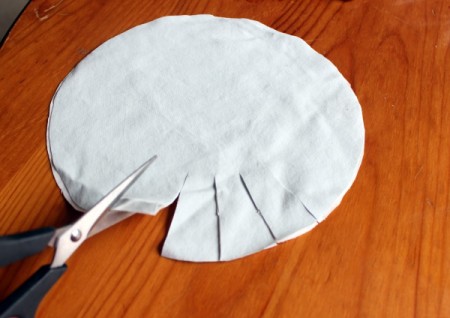 Happy Sad Beanbag - cut slits around the outside long enough to tie